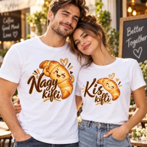 Szerelmes pár fehér Kis kifli és Nagy kifli páros pólóban, mosolygó croissant-grafikákkal és szívekkel.